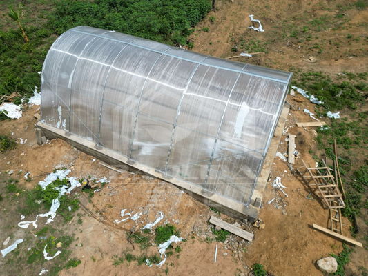 Hot Galvanized Steel Frame Polycarbonate Solar Dryer Greenhouse with Stable Structure Inside Outside Shading System